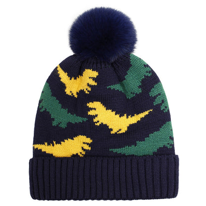 Dark kids pom pom beanie with green and yellow jacquard dinosaurs