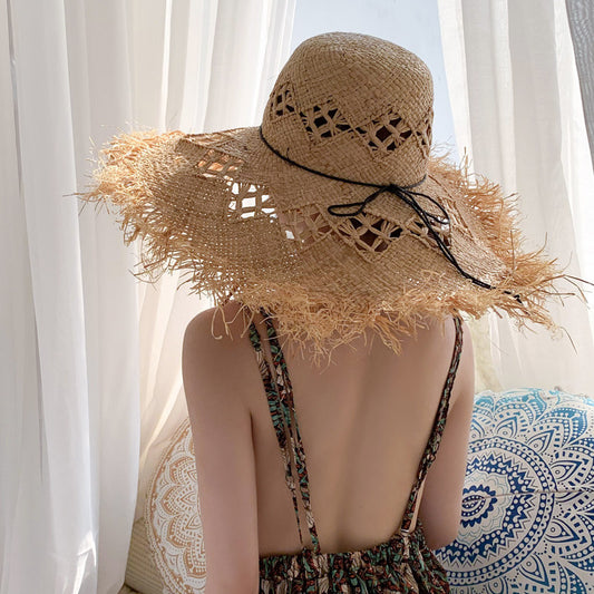 Women's wide brim straw sun hat - product photo 1