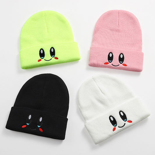 Smile embroidered beanies in yellow pink black and white