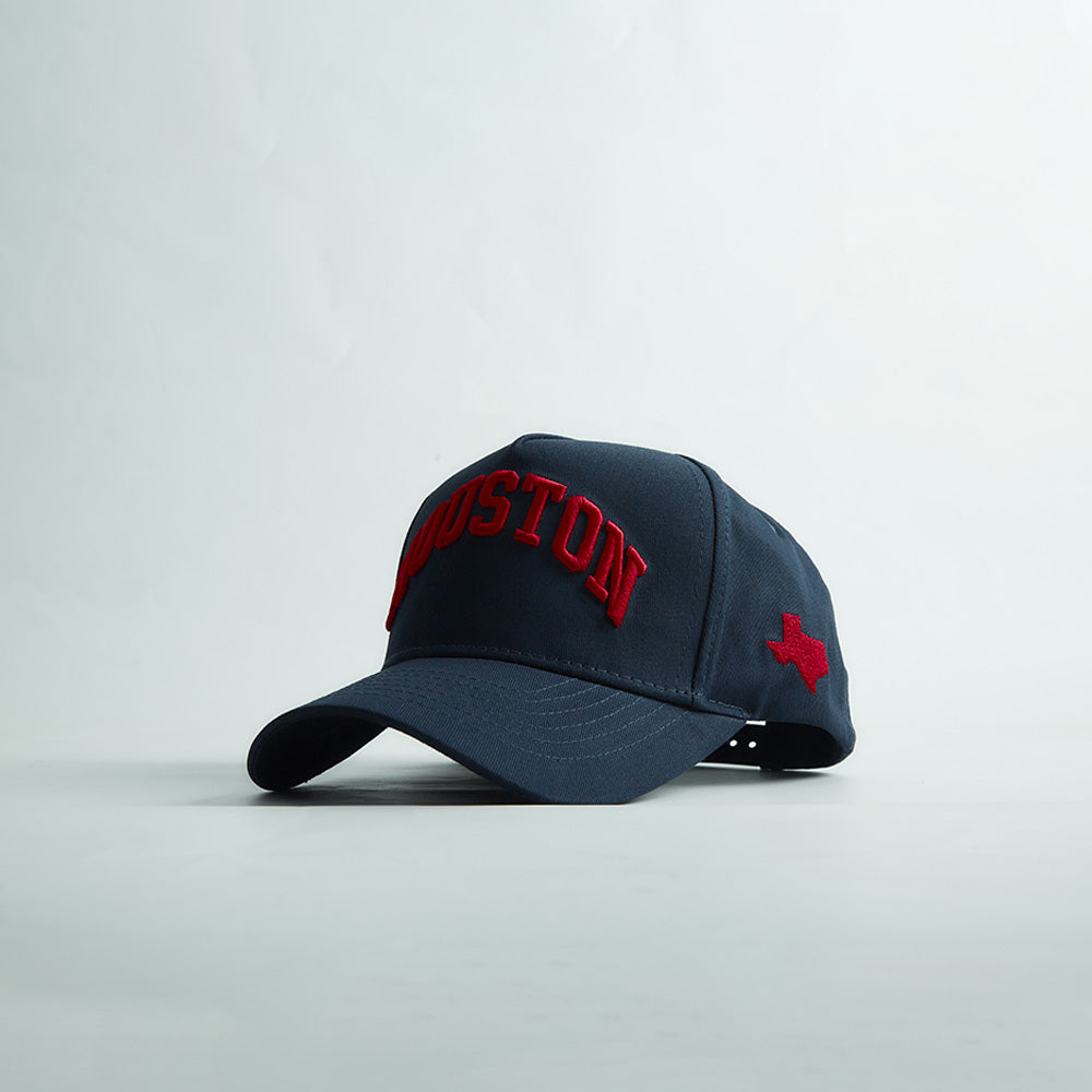 Destination Hat Co. Houston Legacy snapback with navy crown and navy bill, angled view