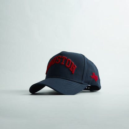 Destination Hat Co. Houston Legacy snapback with navy crown and navy bill, angled view