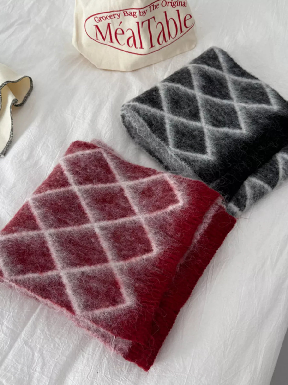 Unisex Diamond Grid Fuzzy Scarf — red and black scarves showing large pale diamond grids