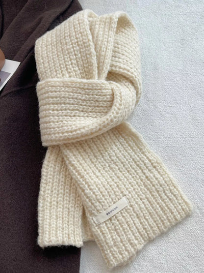 Unisex Cozy Knitted Winter Scarf — 47.2-Inch — off-white scarf loosely looped on a flat surface