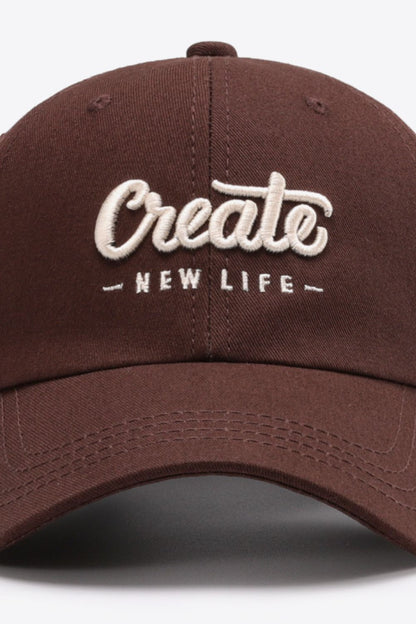 Navy CREATE NEW LIFE cap curved brim detail
