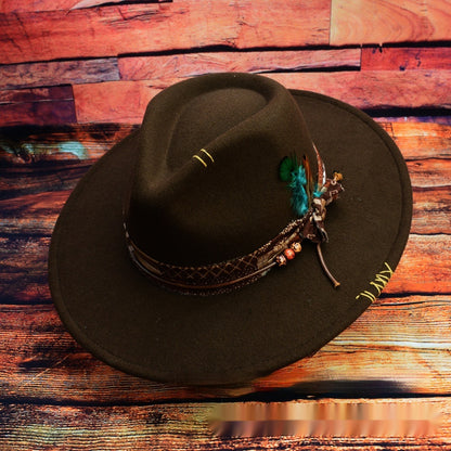 Dark brown vintage western fedora with feather band