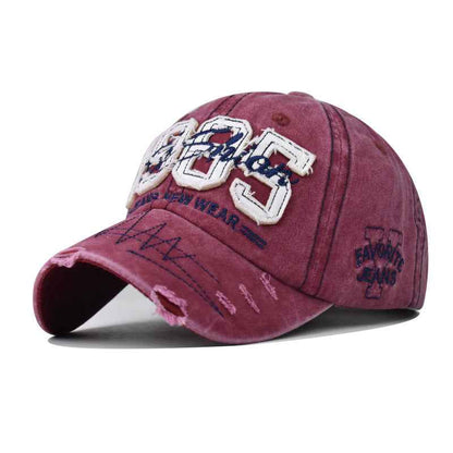 Black 1985 embroidered distressed baseball cap