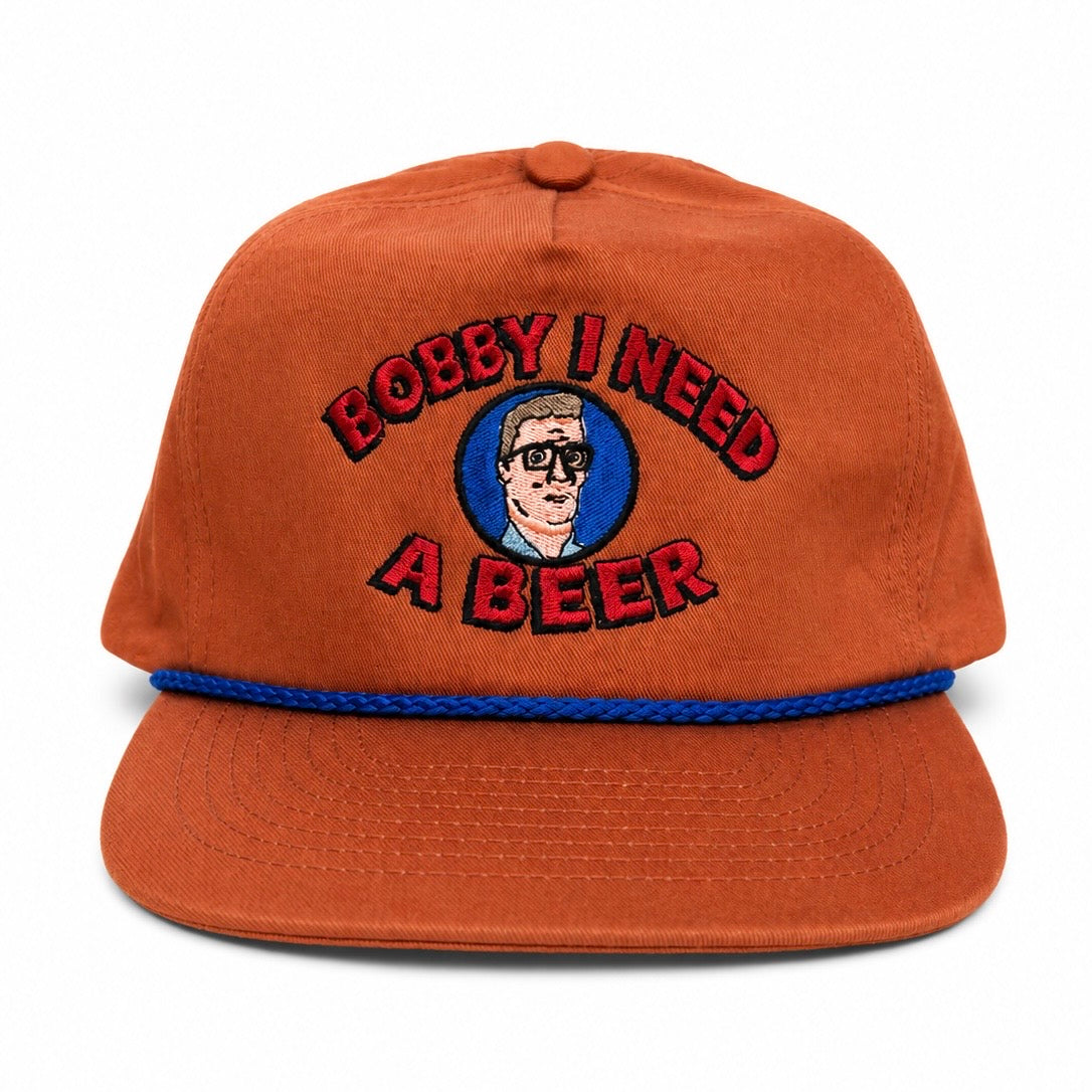 Old School Hats orange Bobby I Need cap with embroidered character, text, and blue rope