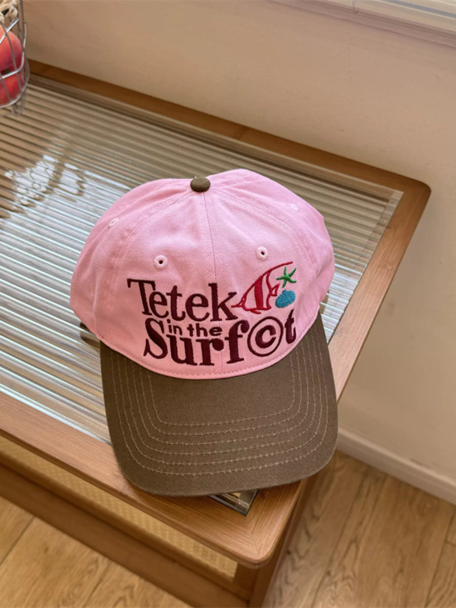 Gorra de béisbol con letra bordada