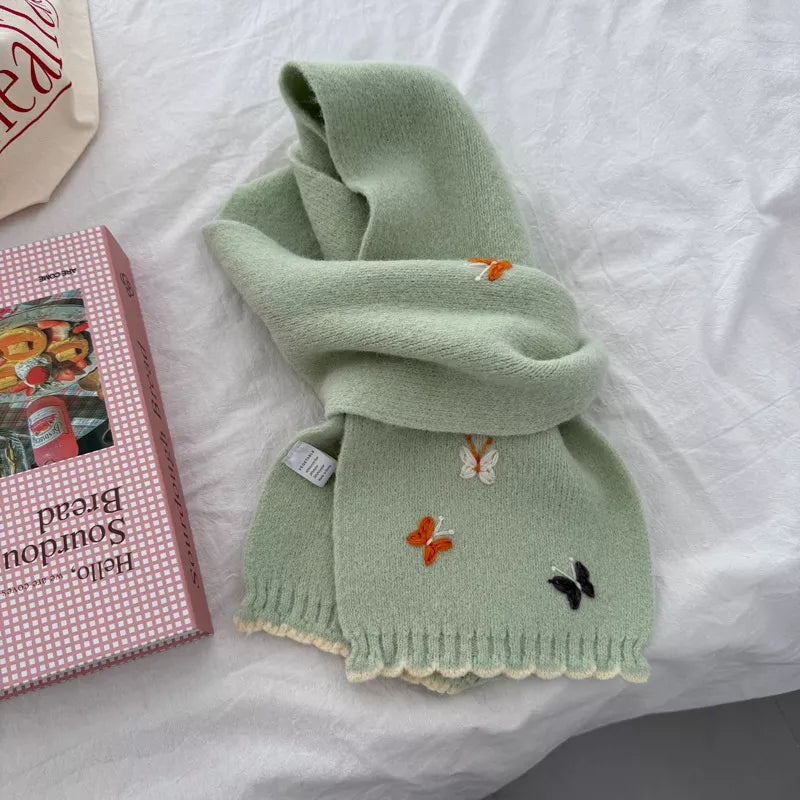 Unisex Butterfly Embroidered Scarf — green embroidered scarf tied with decorated ends visible