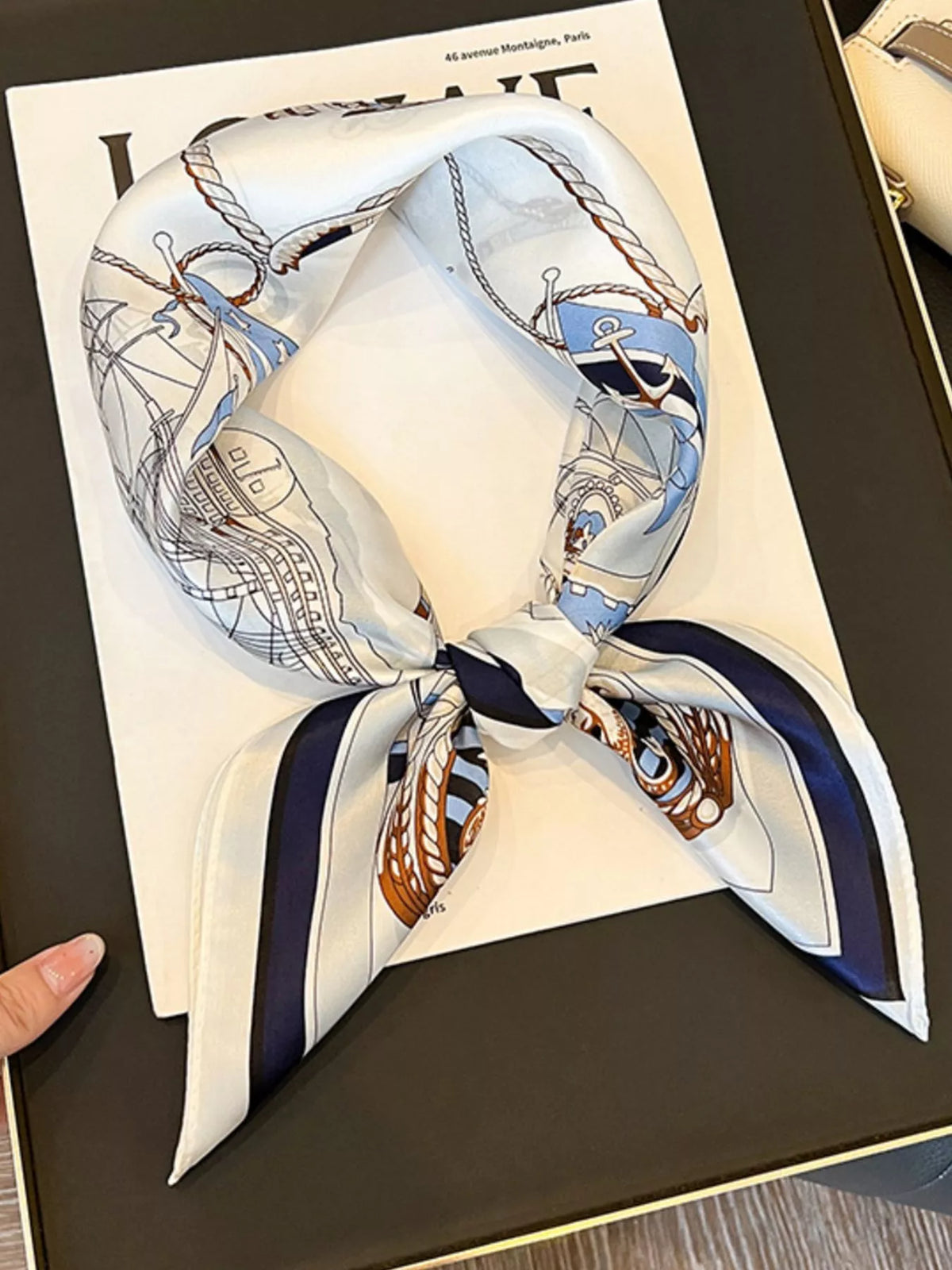Unisex Nautical Print Silk Square Scarf — nautical silk scarf tied to show pale center and dark border