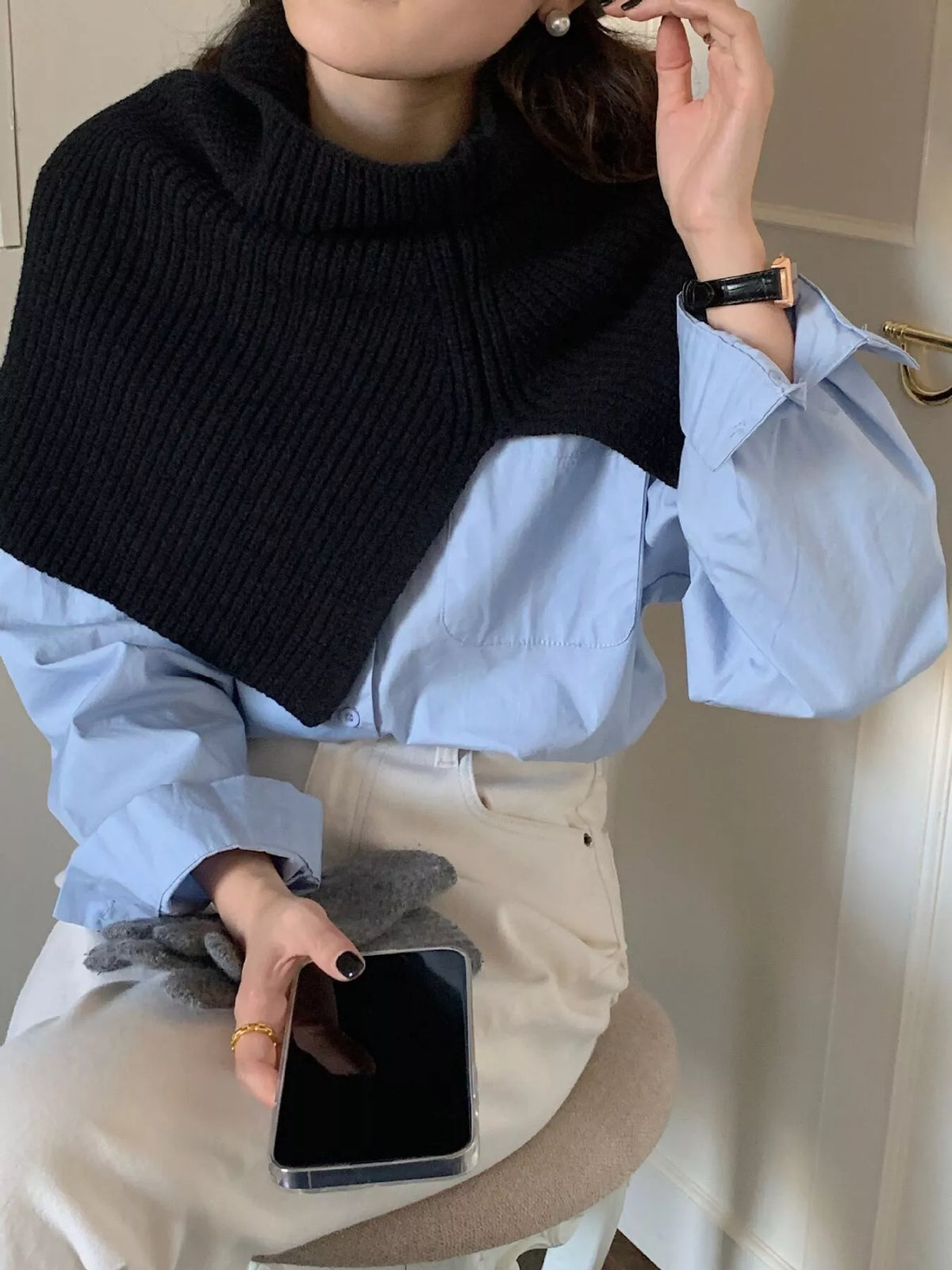 Women's Ribbed Knit Capelet — black high neck capelet worn over a blue blouse