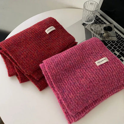 Unisex Marled Wool Blend Scarf — red and rose-toned knitted scarves displayed together