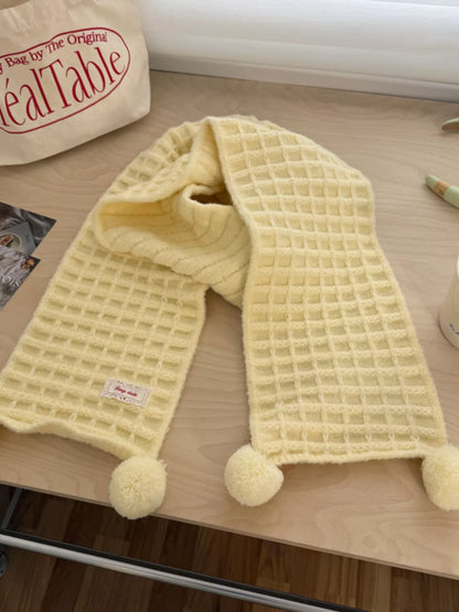 Unisex Pastel Waffle Knit Scarf — creamy yellow waffle scarf looped on a pale surface