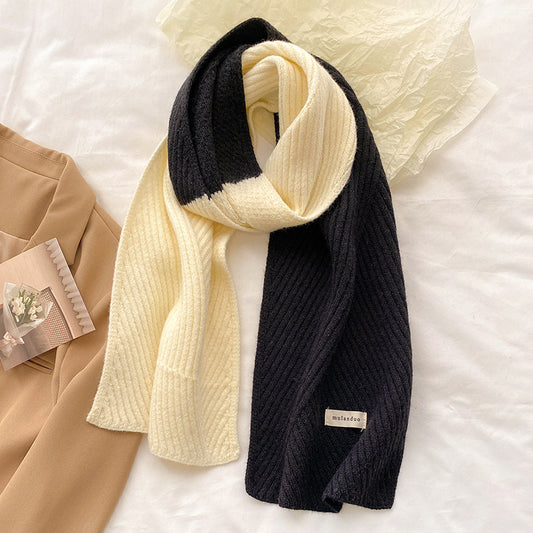 Unisex Two-Tone Ribbed Knit Winter Scarf — black and cream ribbed scarf tied loosely