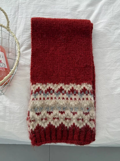 Unisex Nordic Motif Knit Scarf — red scarf laid flat with repeated pale motif bands