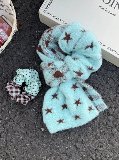 Unisex Star and Check Knit Scarf — mint blue star scarf loosely knotted on a dark surface