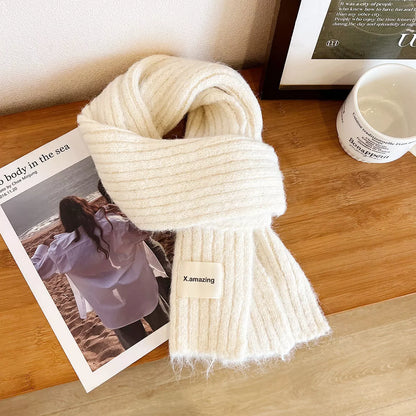 Unisex Soft Ribbed Wool Scarf — cream scarf arranged with ribbed ends visible