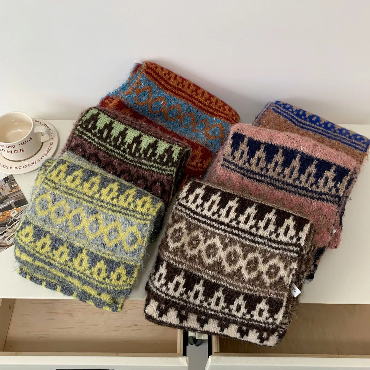 Unisex Vintage Knitted Pattern Warm Scarf — overlapping geometric scarves showing contrasting motif bands