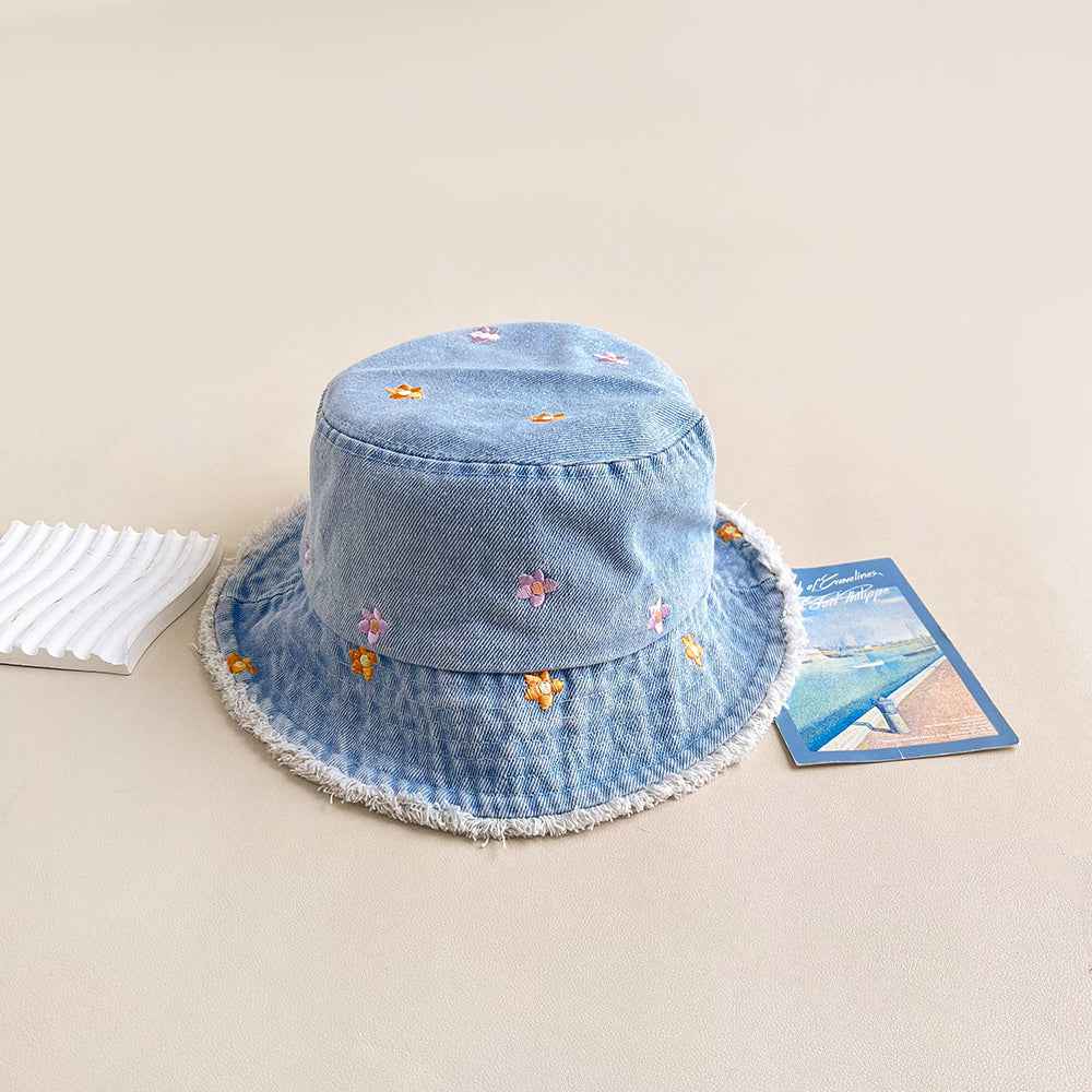 Women's Light blue Flower Embroidered Denim Bucket Hat with Frayed Brim curved brim detail