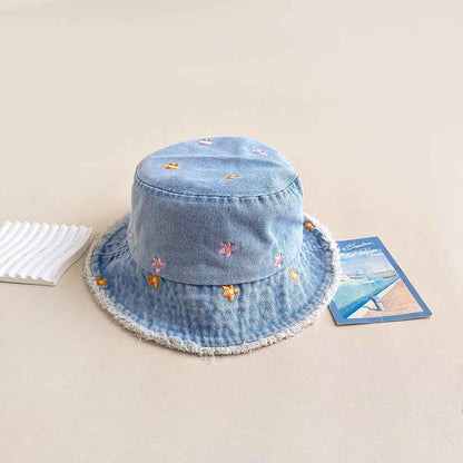 Women's Light blue Flower Embroidered Denim Bucket Hat with Frayed Brim curved brim detail
