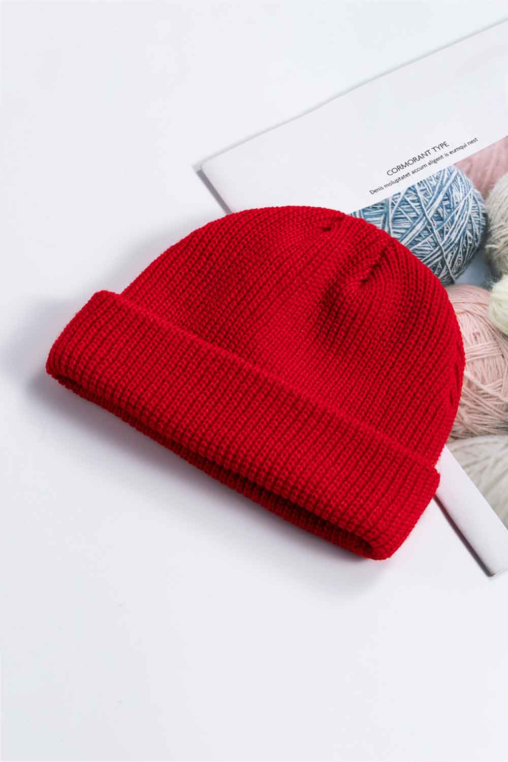 Olive rib-knit cuff beanie casual flat lay