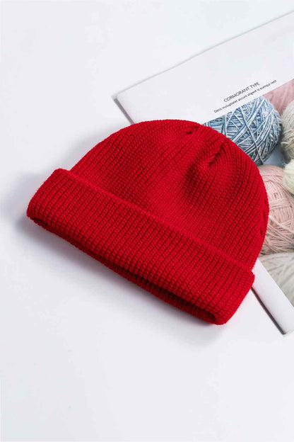 Olive rib-knit cuff beanie casual flat lay
