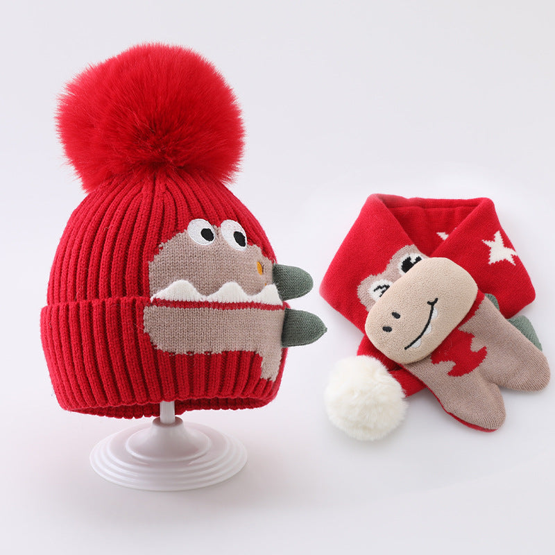 Red dinosaur pom pom beanie with a matching red scarf