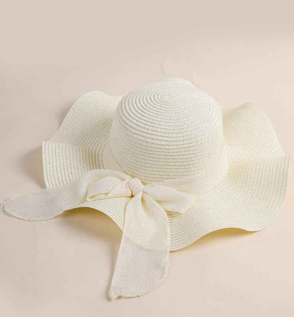 Women's Beige Linen Ribbon Handwoven Wide Brim Bow Straw Sun Hat front view