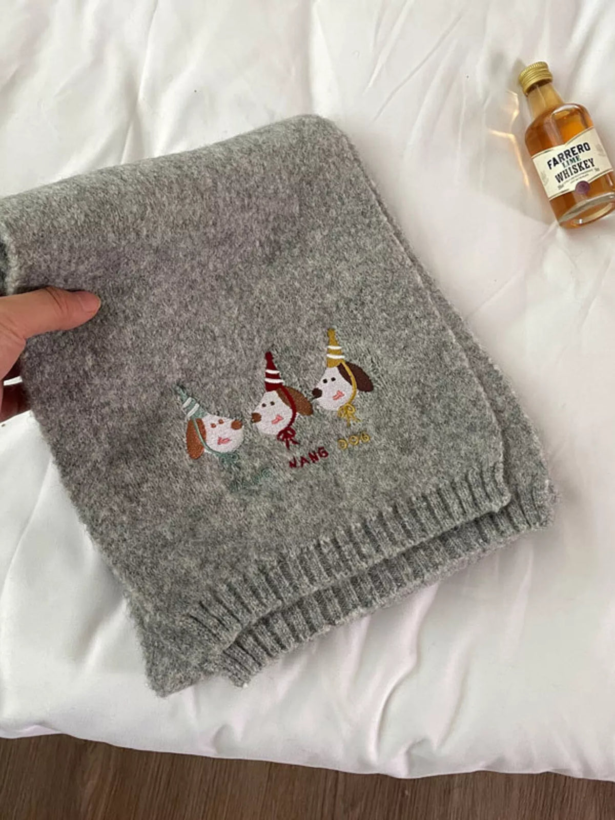 Unisex Embroidered Dog Knit Scarf — gray scarf laid flat with dog embroidery visible