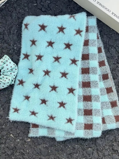 Unisex Star and Check Knit Scarf — folded mint scarf showing repeated dark stars
