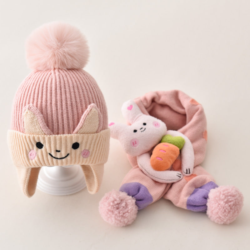 Pink animal earflap beanie and matching scarf with character details