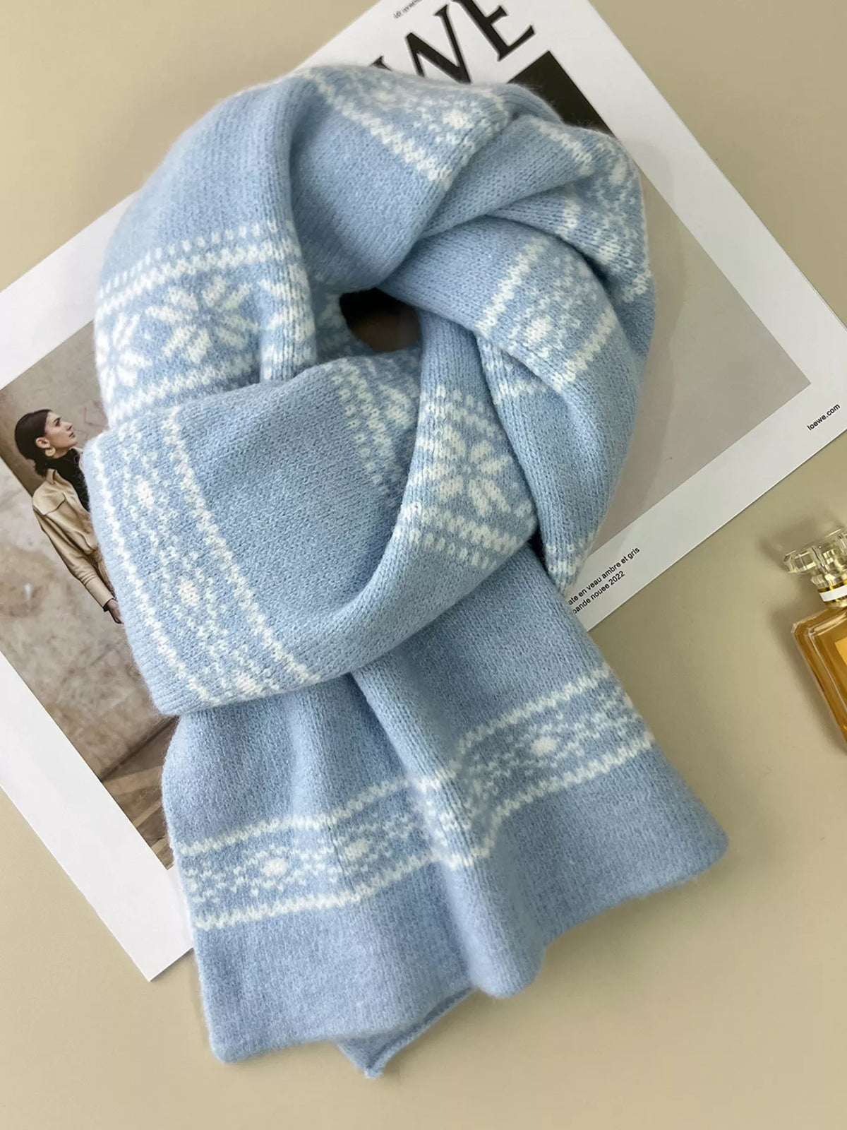Unisex Winter Snowflake Pattern Knitted Scarf — closer view of blue snowflake scarf knotted flat