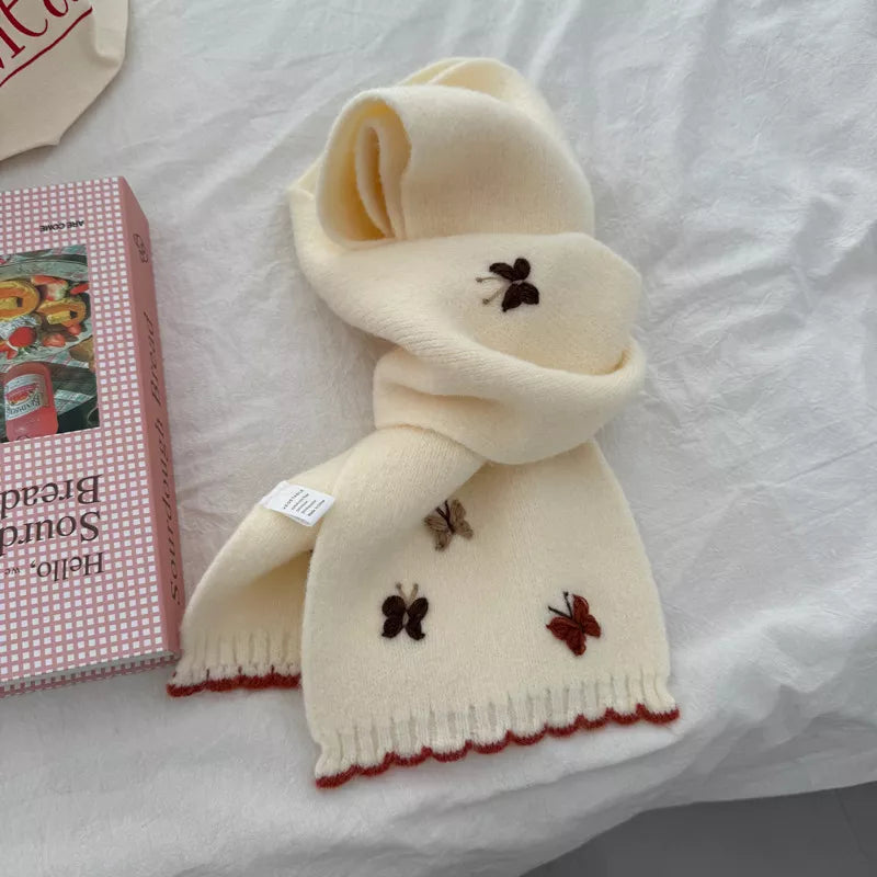 Unisex Butterfly Embroidered Scarf — pale scarf tied with butterfly embroidery near the ends