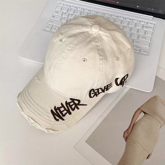 Compact distressed embroidered baseball cap - product photo 1