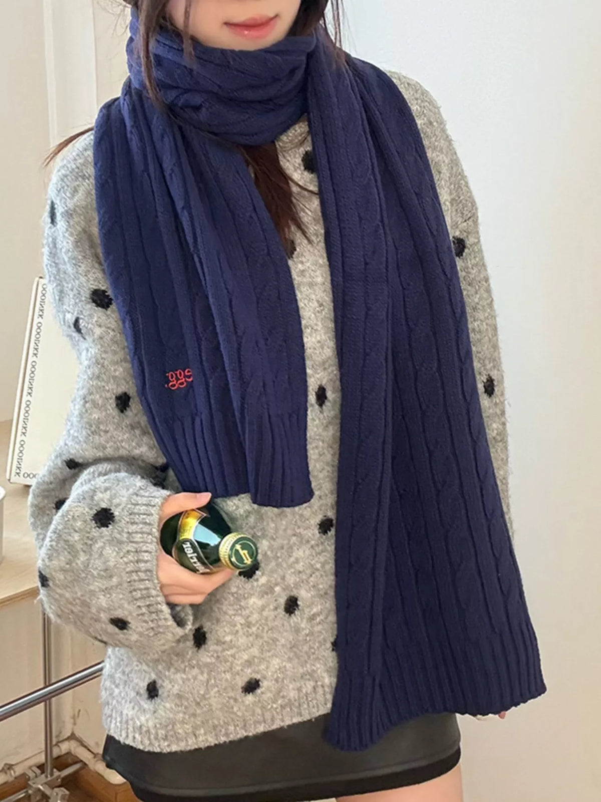 Unisex Cable Rib Winter Scarf — blue scarf worn open over a pale cardigan