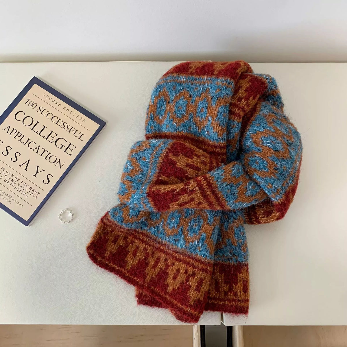 Unisex Vintage Knitted Pattern Warm Scarf — rust and blue patterned scarf loosely knotted