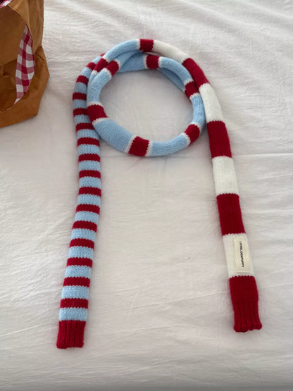 Unisex Red Stripe Skinny Scarf — long skinny scarf shown in a curved arrangement