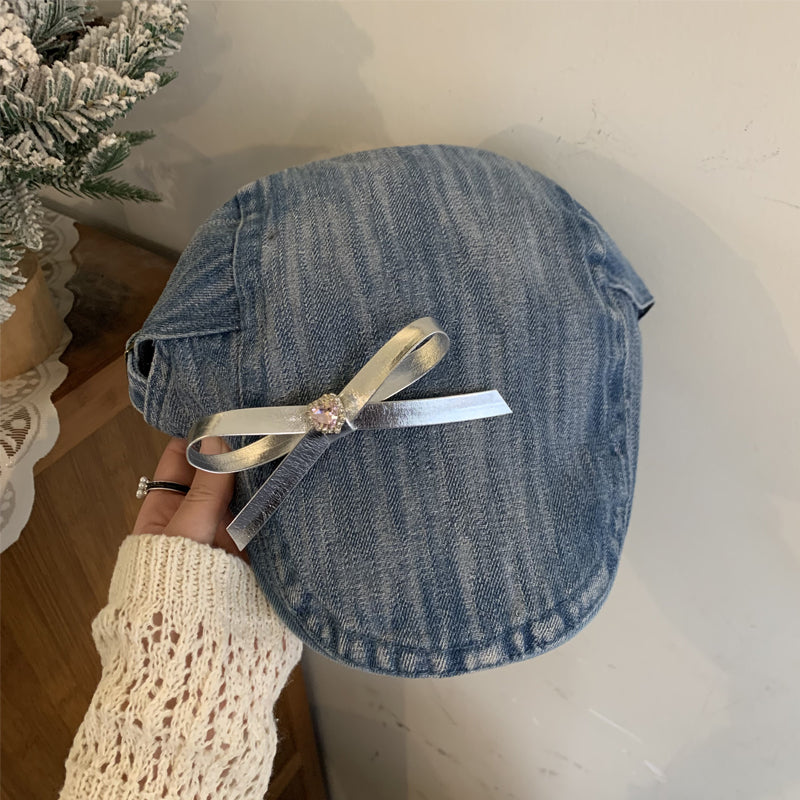 Womens vintage denim newsboy cap with bow - product photo 1