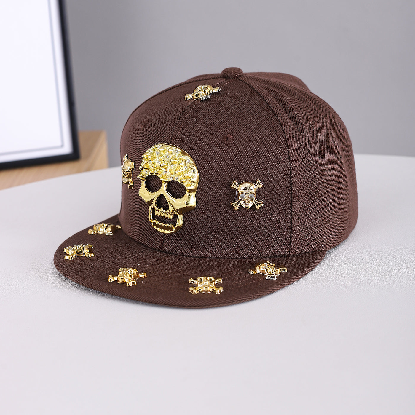 Unisex Brown Gold Skull Embellished Snapback Cap embroidery close-up