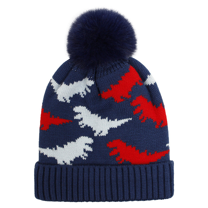 Navy dinosaur knit beanie with red and gray motifs