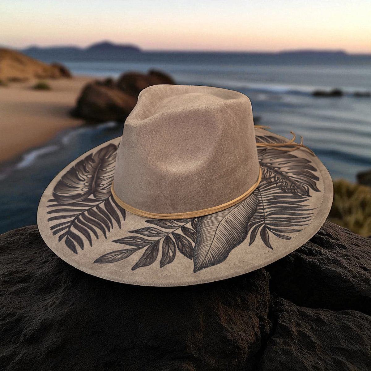 Side angle of the light taupe High Definition hat near the coast