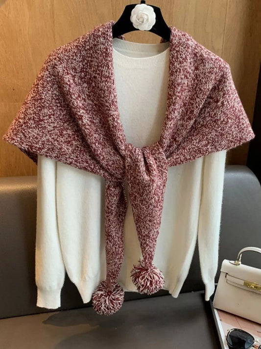Women's Wool Pom-Pom Shawl — coral wool shawl tied across a pale top