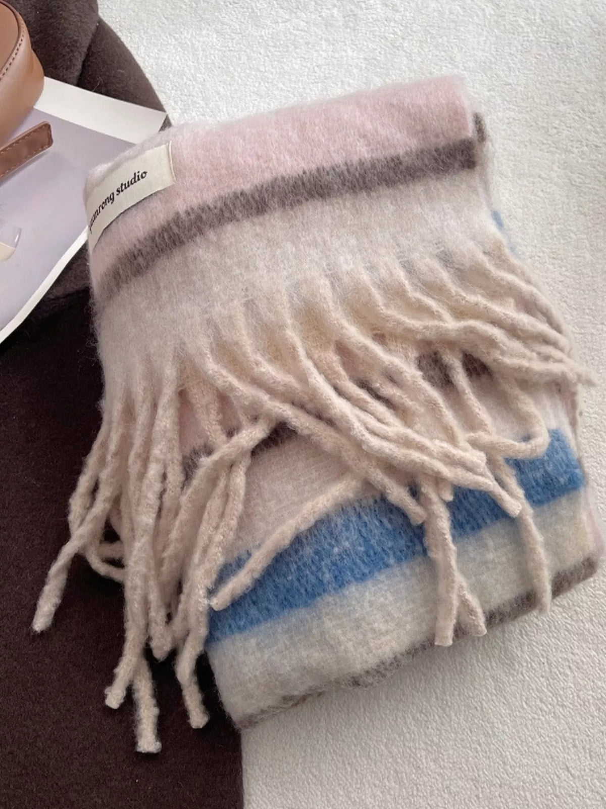 Unisex Soft Plaid Tassel Warm Scarf — folded pastel plaid scarf with long pale tassels