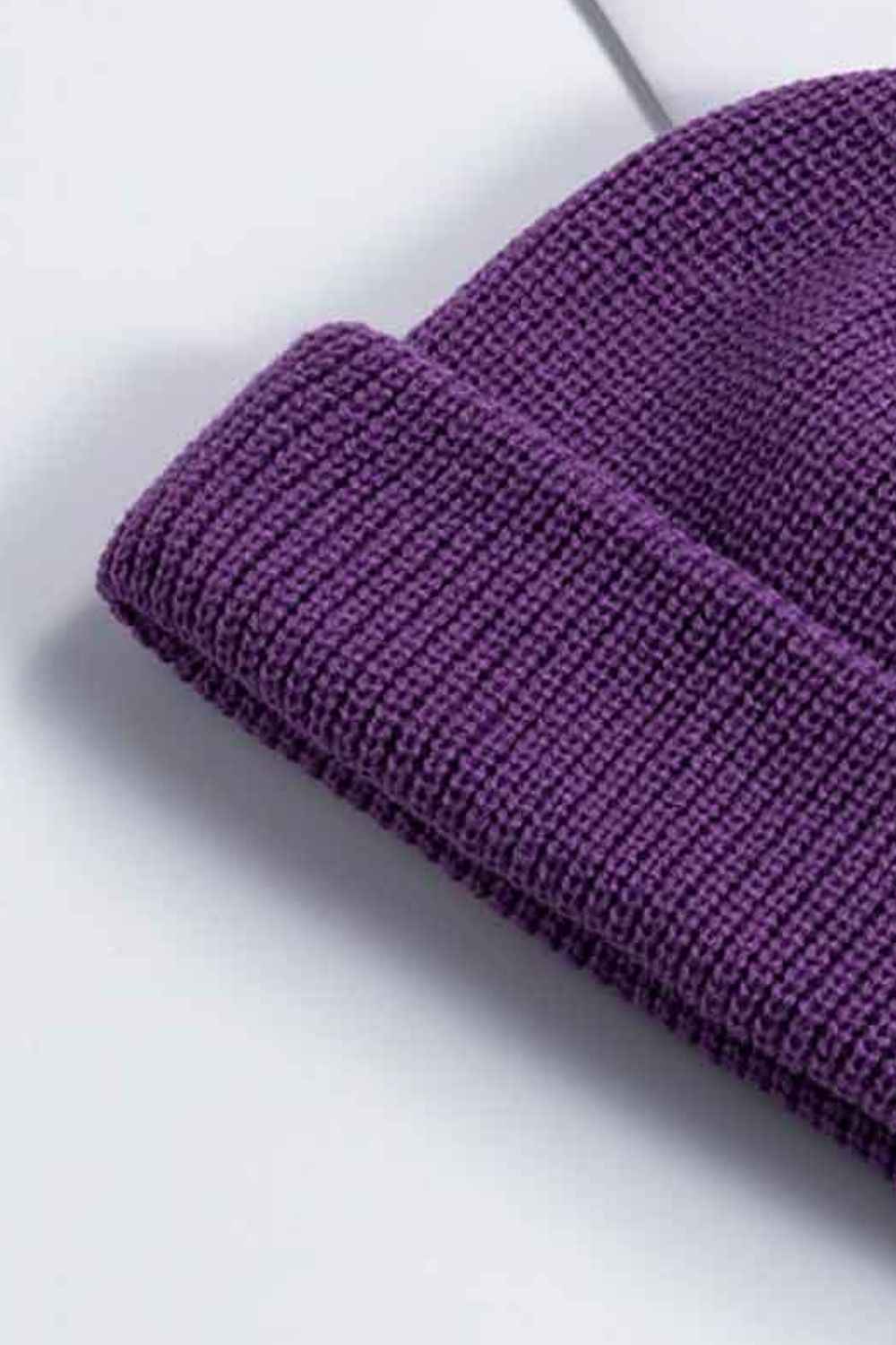 Red rib-knit cuff beanie front profile