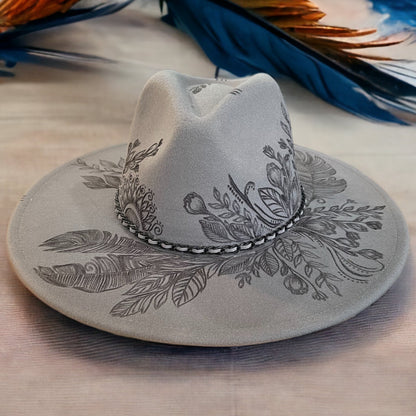 Grey Piper Topknot fedora with burned botanical artwork across its wide brim