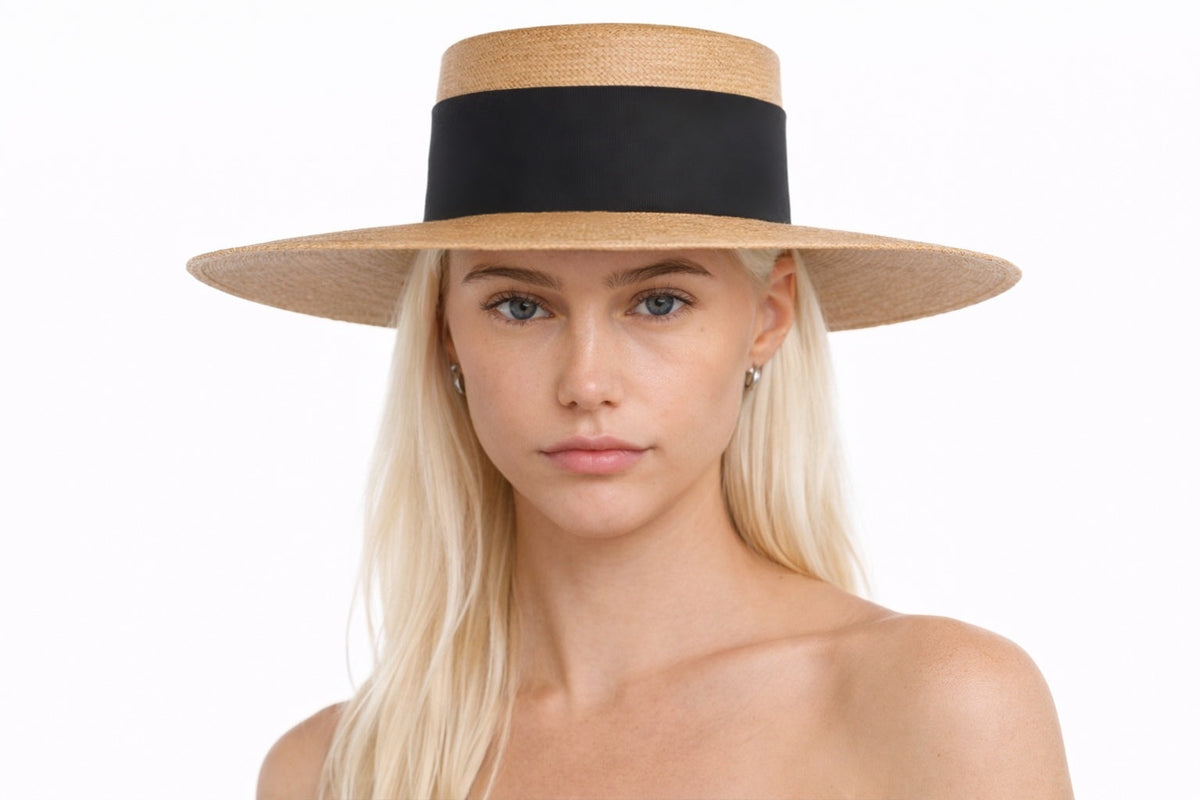 ASN Hats Isla Bonita natural boater hat, worn by a model in a light outfit