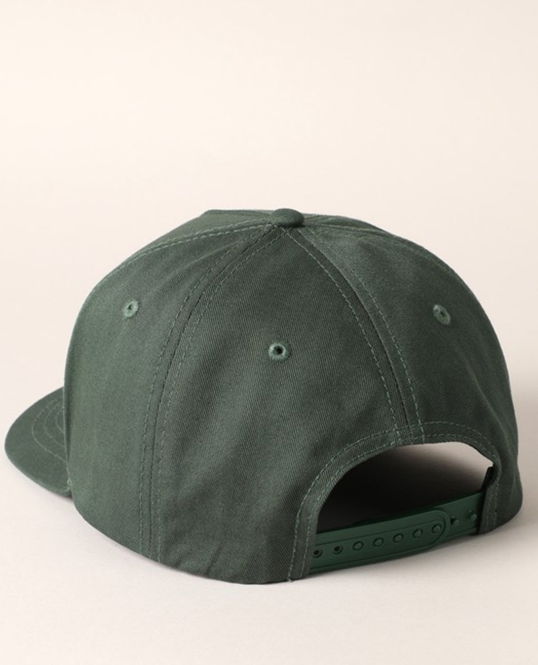 Rear view of the dark green cap showing its adjustable closure