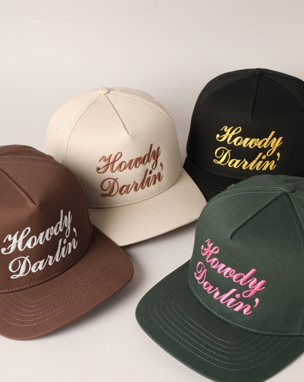 Piper Howdy Darlin' embroidered baseball caps arranged in four colors