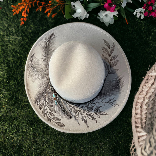 Grey Piper Feathers & Tumbleweeds bolero hat with botanical artwork, overhead view
