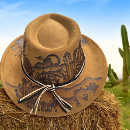 Overhead view of the Desert Sun cowboy hat showing the full desert-inspired brim artwork